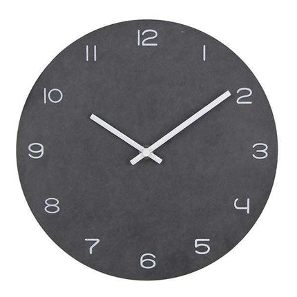 Minimalistisk rundt design vægur til stuen
