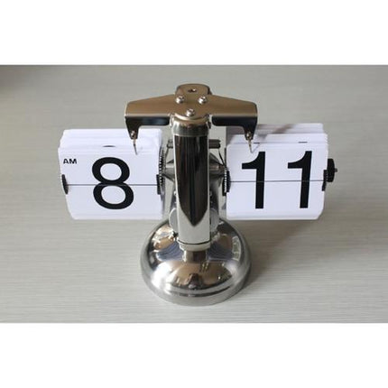 Vintage flip ur i skinnende metal