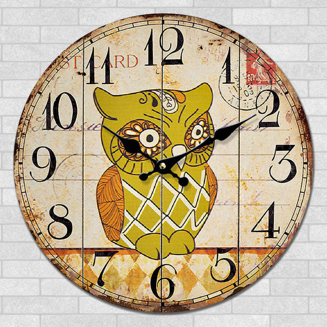 Rundt vægur med ugle motiv