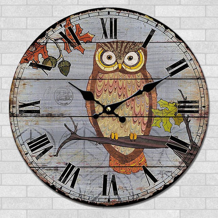 Rundt vægur med ugle motiv