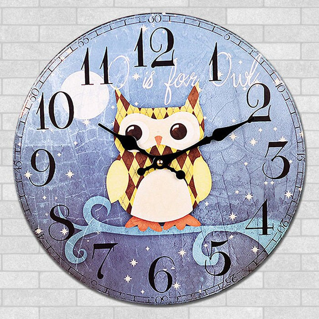 Rundt vægur med ugle motiv