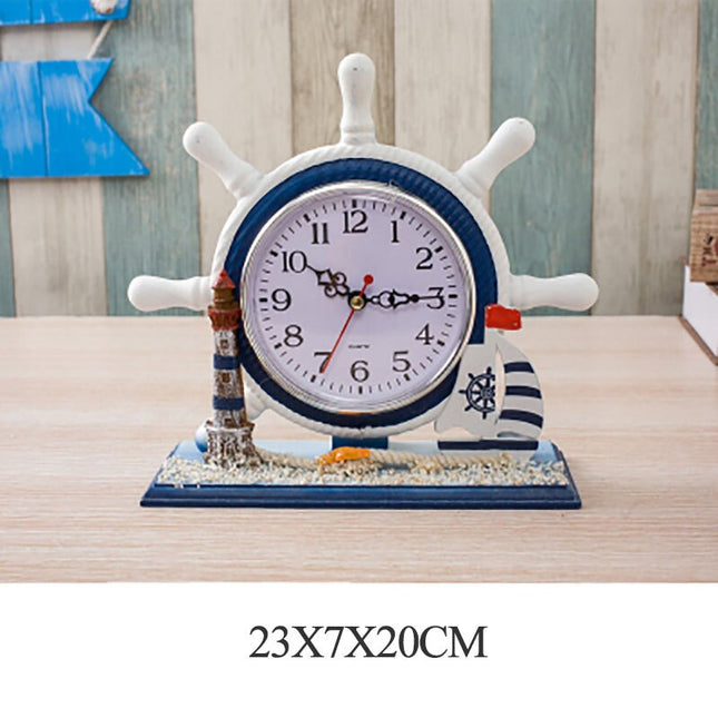 Maritimt bordur med ror og fyrtårn