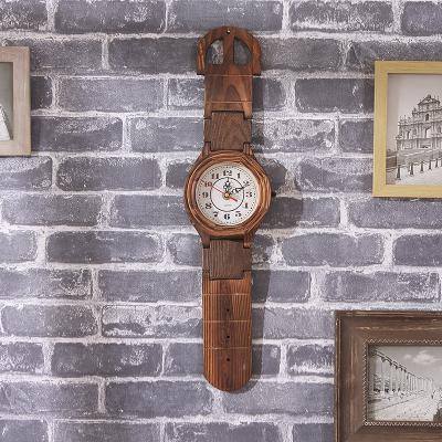 Kæmpe vægur formet som armbåndsur