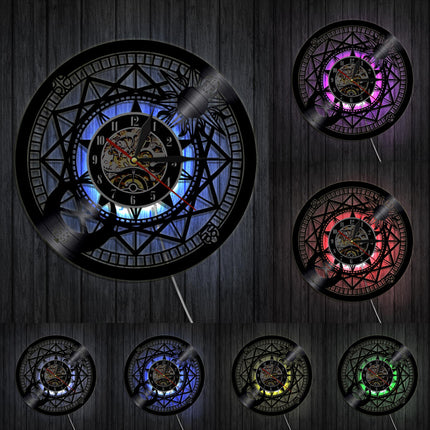 Astrologisk vægur af sort vinylplade