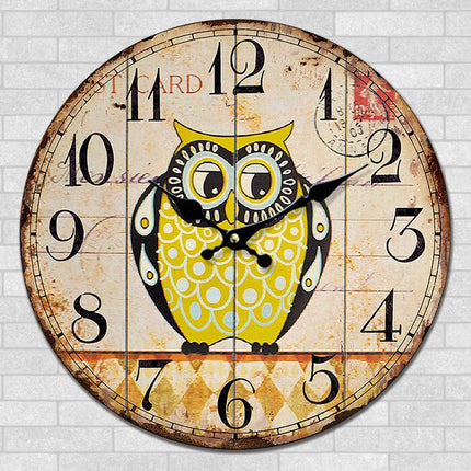 Rundt vægur med ugle motiv