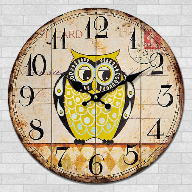 Rundt vægur med ugle motiv