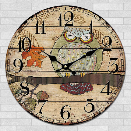 Rundt vægur med ugle motiv