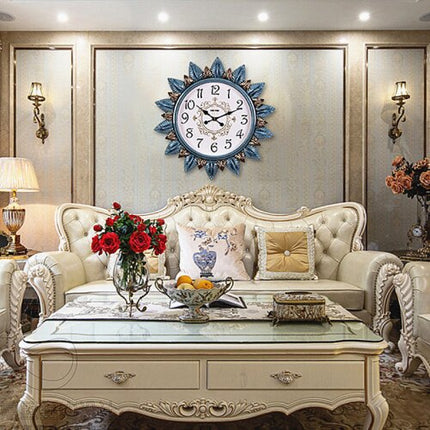 Dekorativt vægur formet som sol