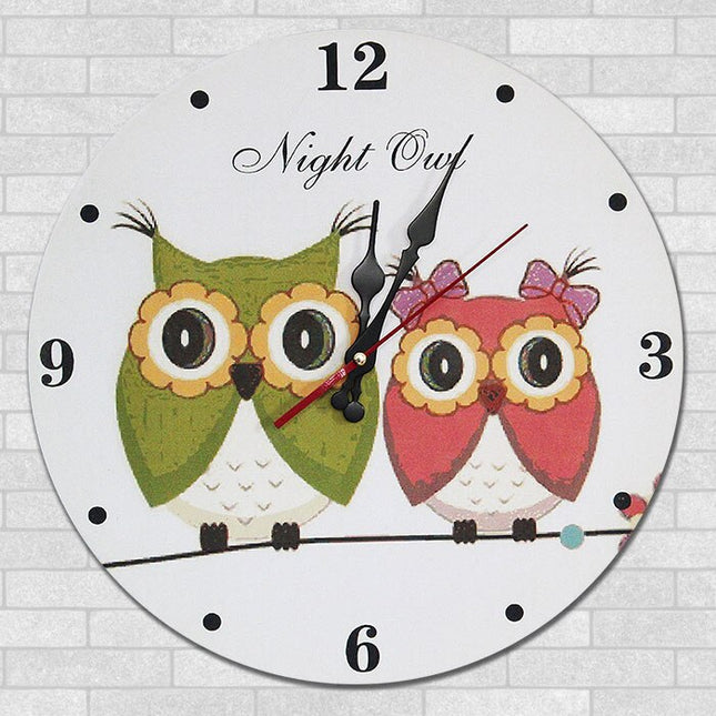 Rundt vægur med ugle motiv