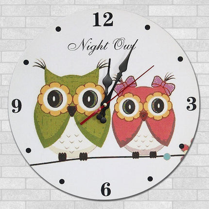 Rundt vægur med ugle motiv