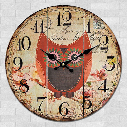 Rundt vægur med ugle motiv