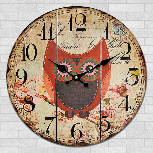 Rundt vægur med ugle motiv