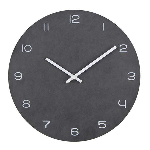 Minimalistisk rundt design vægur til stuen