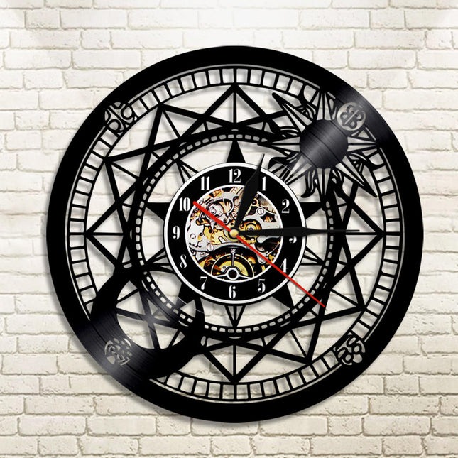Astrologisk vægur af sort vinylplade