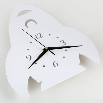 Hvidt vægur formet som raket