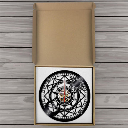 Astrologisk vægur af sort vinylplade