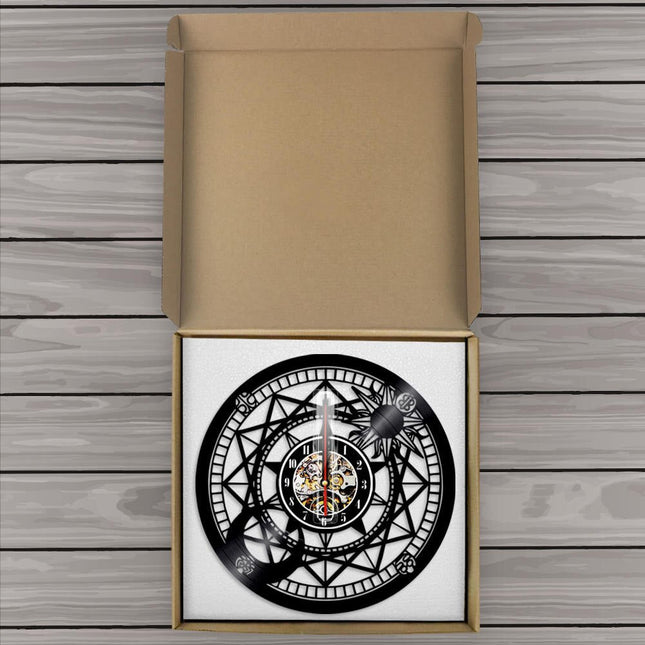 Astrologisk vægur af sort vinylplade