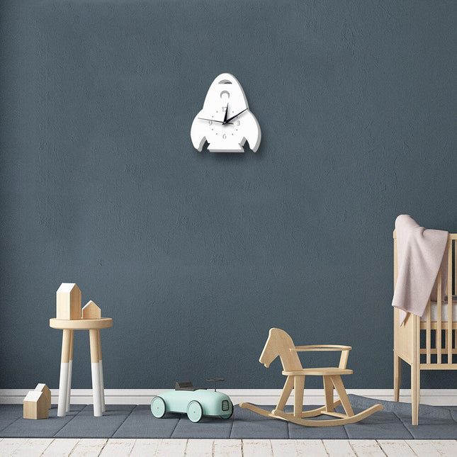 Hvidt vægur formet som raket