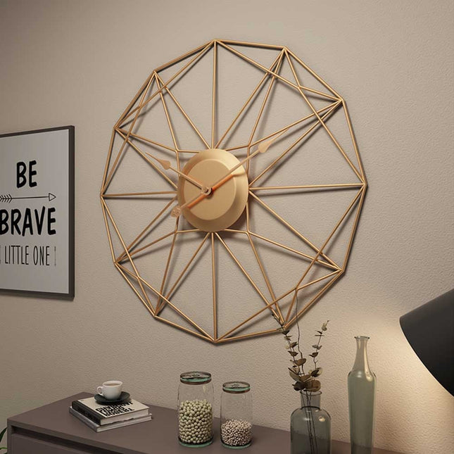 Minimalistisk tråddesign vægur i guld