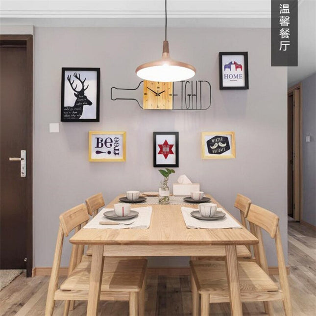 Moderne vægur formet som flaske