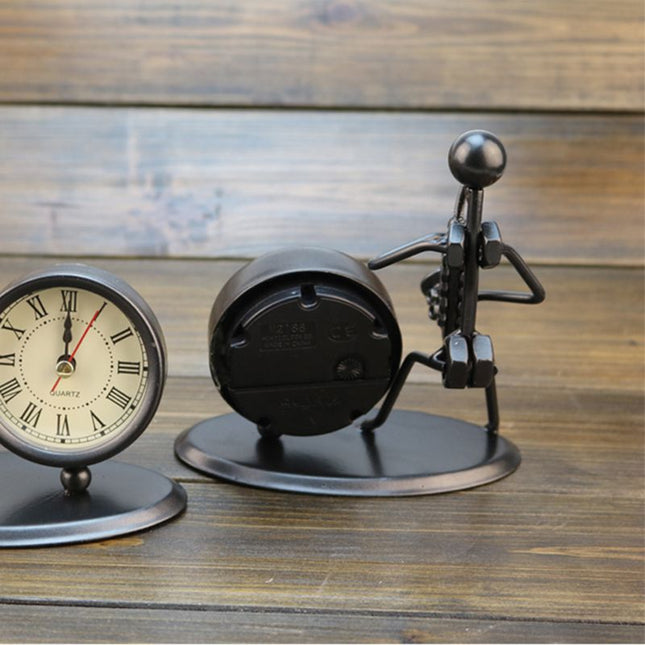 Dekorativt bordur i jern med figur