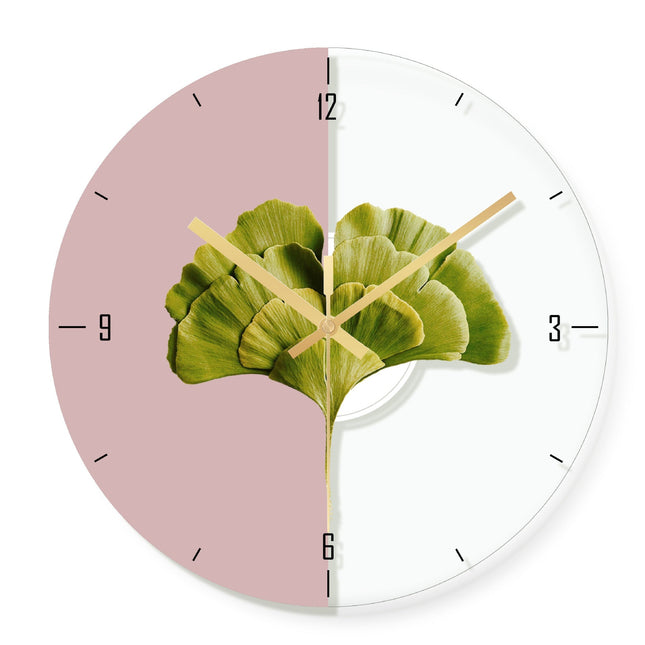 Vægur med gyldent palmeblad motiv