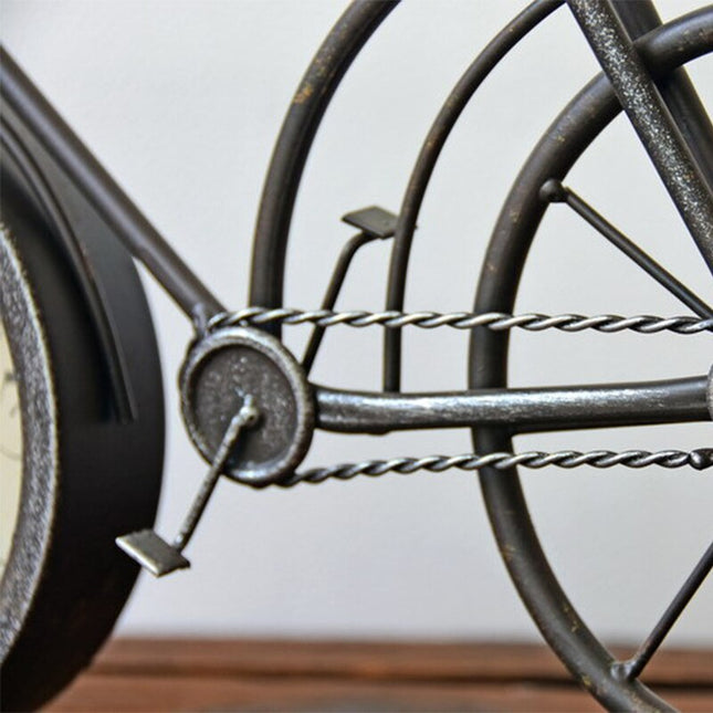 Dekorativt bordur formet som cykel