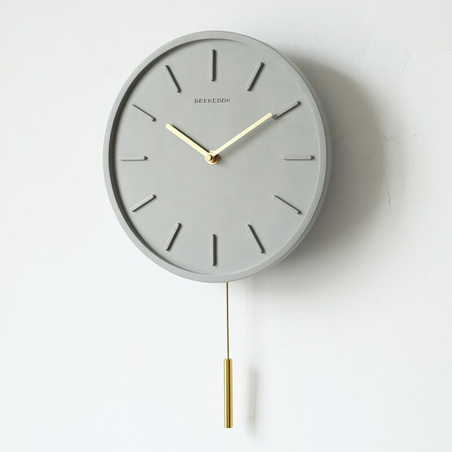Lille minimalistisk vægur i cement-look