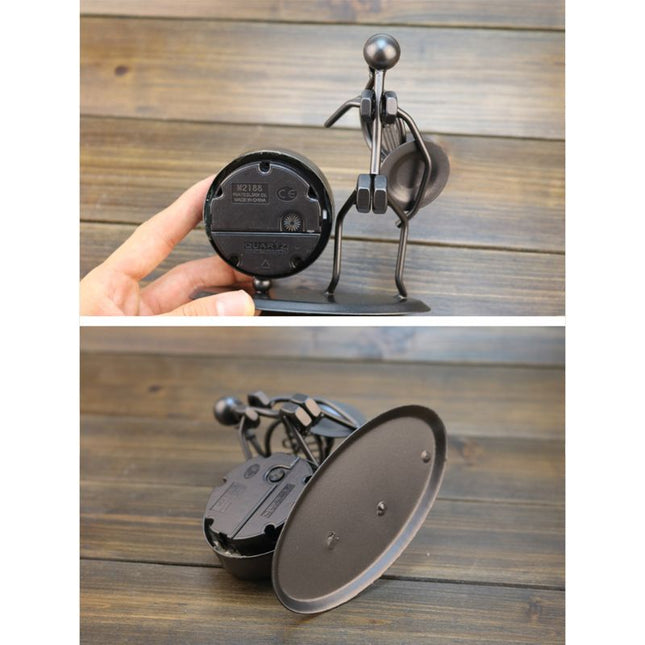 Dekorativt bordur i jern med figur