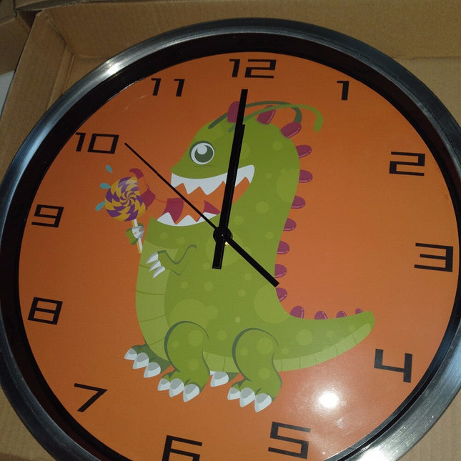 Orange børneur med grøn dinosaur