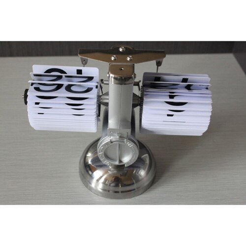 Vintage flip ur i skinnende metal