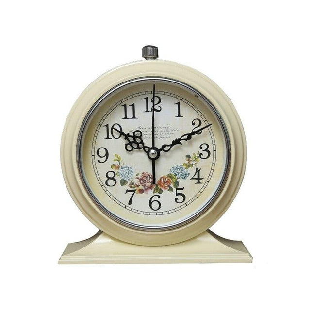 Rundt retro vækkeur med blomstermotiv