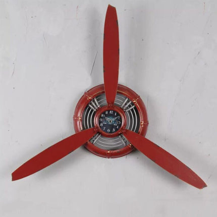 Unikt vægur formet som flypropel