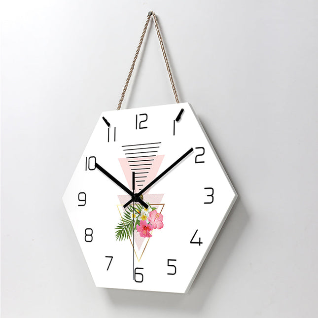 Sekskantet vægur med geometrisk blomsterdesign