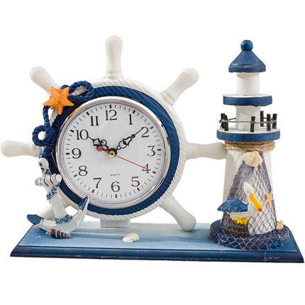 Maritimt bordur med ror og fyrtårn