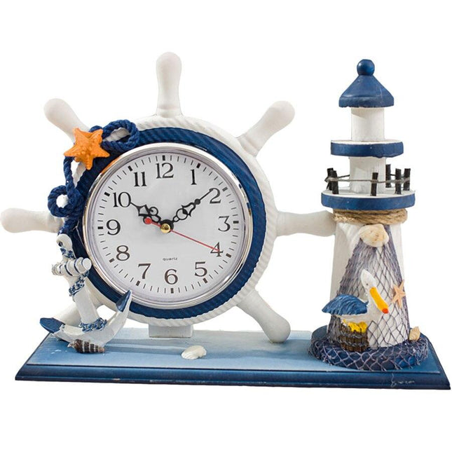 Maritimt bordur med ror og fyrtårn