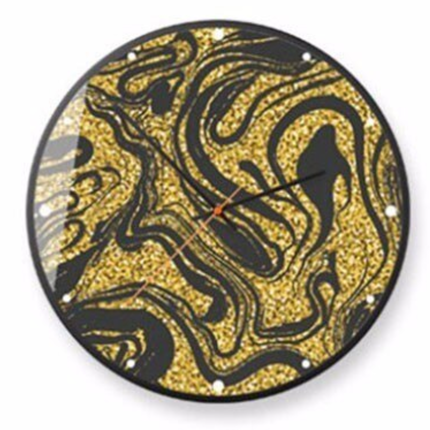Rundt vægur med guld og sort mønster