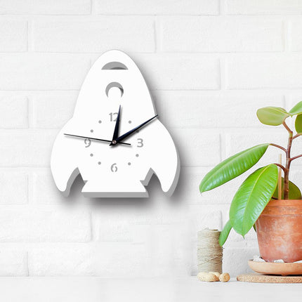 Hvidt vægur formet som raket