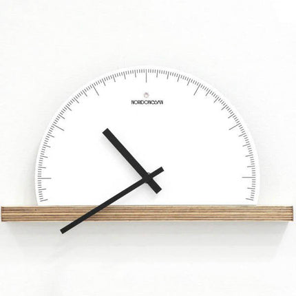Halvrundt minimalistisk vægur til hylde