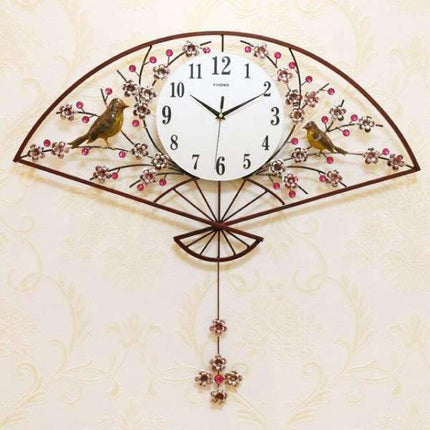 Stort vifteformet vægur med fugle