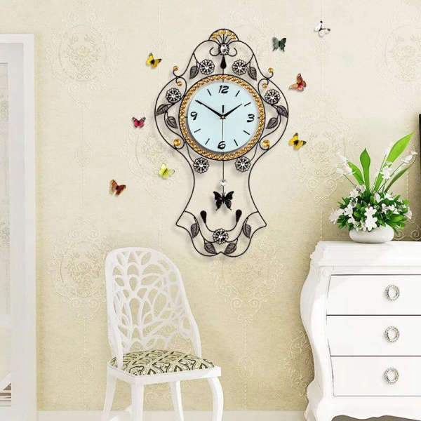 Vintage pendulur med sommerfugle dekoration