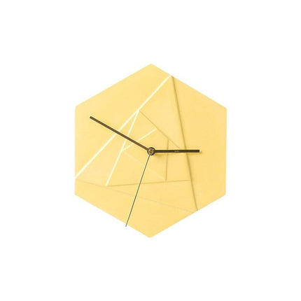 Gult geometrisk vægur i 3D design