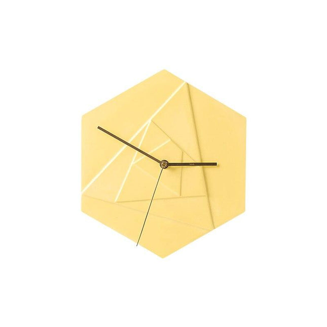 Gult geometrisk vægur i 3D design